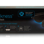 Sound Oasis Just Darkness Sleep Therapy Mask box, model GTS-800, featuring a black design with blue text and graphics showing the mask and its panels.